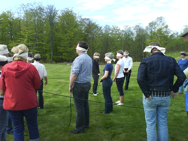 Group exercise with blindfolds