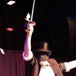 Rosini catches a card on the sword
