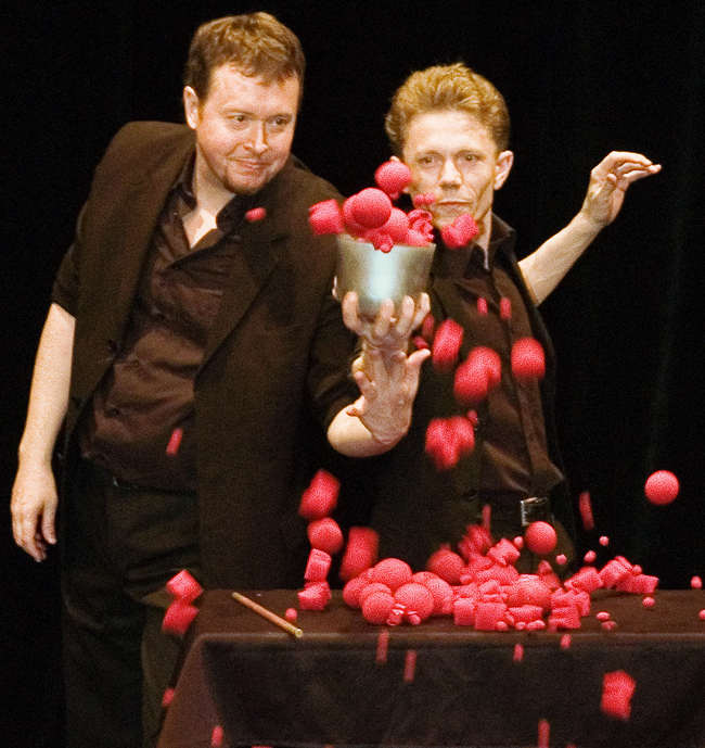 Peter Rosengren and Tom Stone producing hundreds of red balls from a bowl