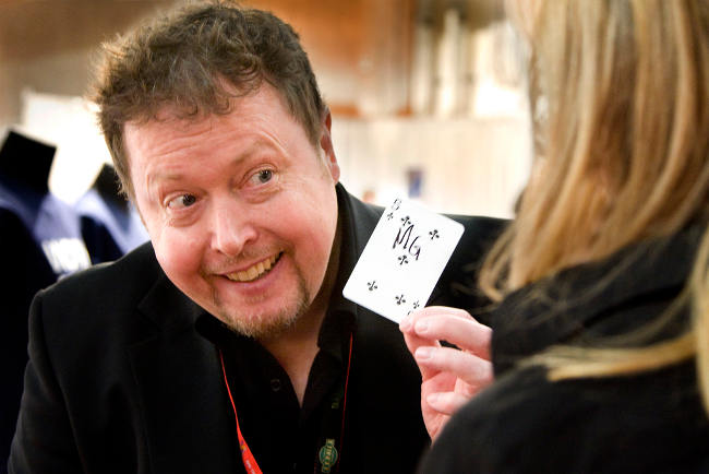 Peter showing the chosen card one on one