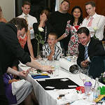 Peter performing at the head table during a wedding